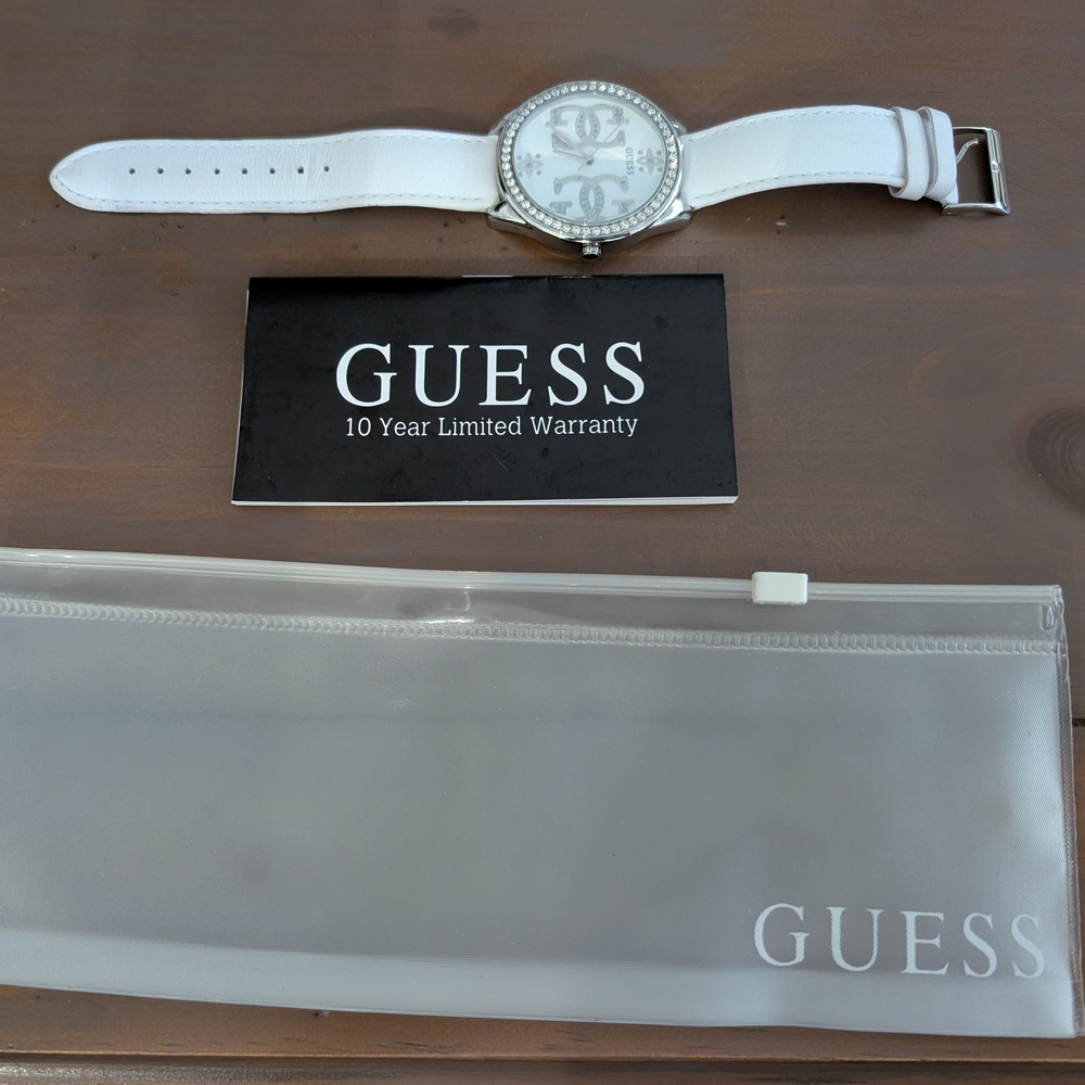 Guess Silver Wristwatch with White Band and Modern Aesthetic